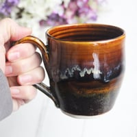 Image 8 of Amber Brown, and Matte Black Pottery Mug, 12 oz. Handcrafted Coffee Cup, Made in USA