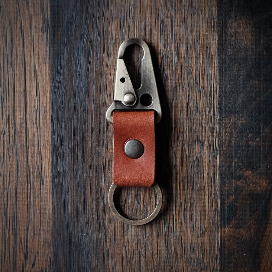 Image of Old Dutch Snap Trigger Key Chain. (Cognac)