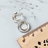 Image 4 of Dainty silver and gold circle earrings