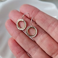 Image 3 of Dainty silver and gold circle earrings
