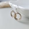 Dainty silver and gold circle earrings