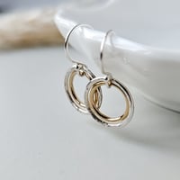 Image 2 of Dainty silver and gold circle earrings