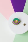 Pin ojo Neptuno