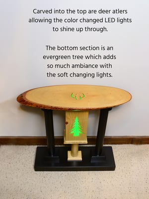 Image of Handmade Wooden Live Edge End Table with color changing LED lights, Carved deer antler and pine tree