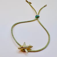 Image 1 of Gold aeroplane rope bracelet 