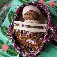 Image 4 of Ensemble crochet artisanal – Poupon Kaly, couffin en wax et linge de lit 3 pièces (N6)