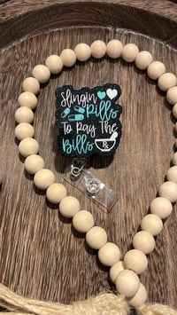 Image 1 of Slinging Pills Badge Reel