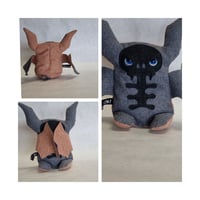 Image 1 of Tan, Furry, Floral, Black and Tweed Bats