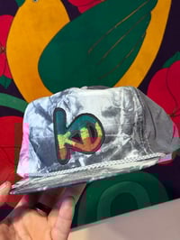 Image 2 of KD Rasta hat. Dwellers on the strap