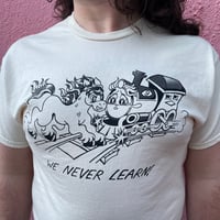 Image 1 of WE NEVER LEARN Tee