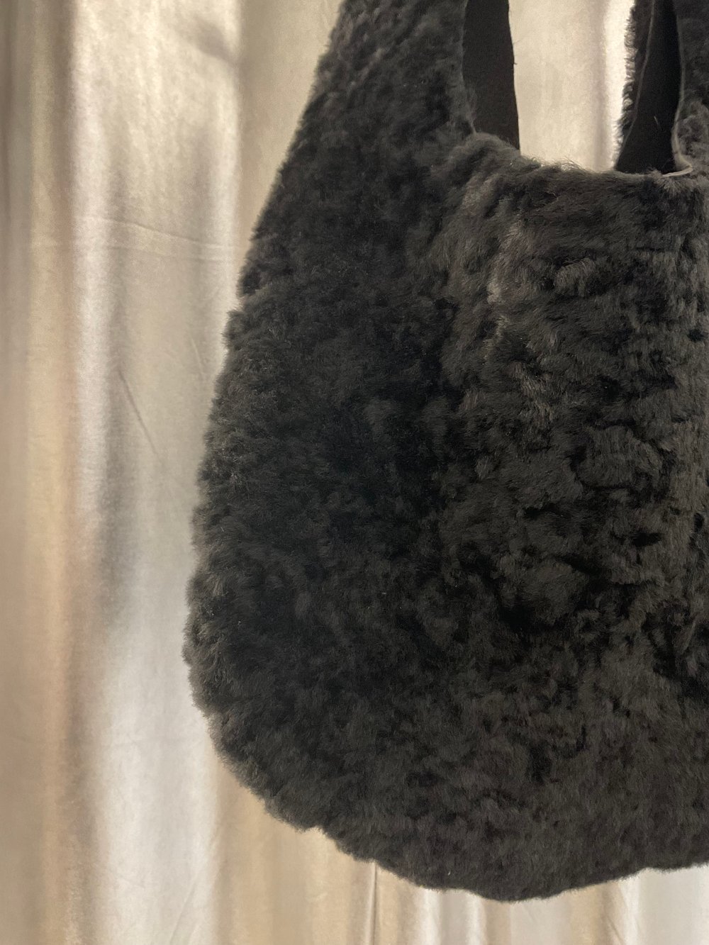 Black fur hobo bag