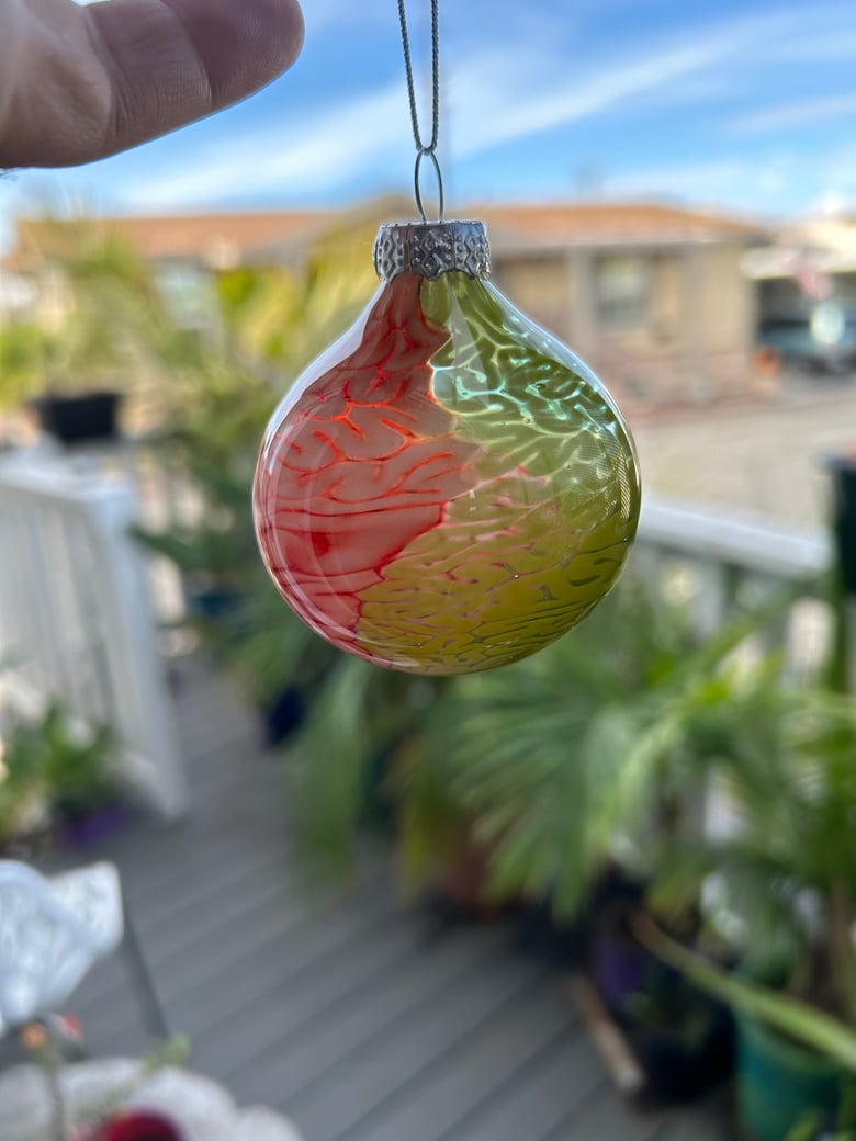Image of Green and red Christmas ornament