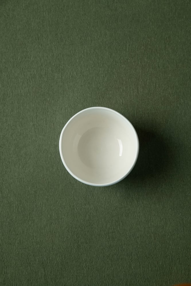 Image of cup-spinning top