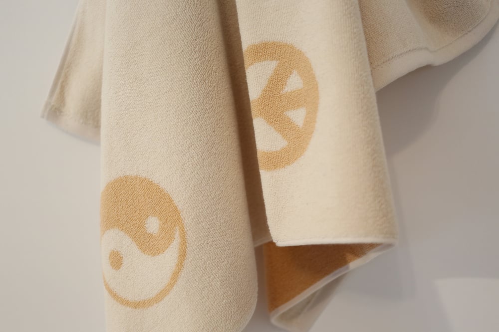 Image of Sparse Peace Kid Towel<div>Creamâ€“Scour</div>