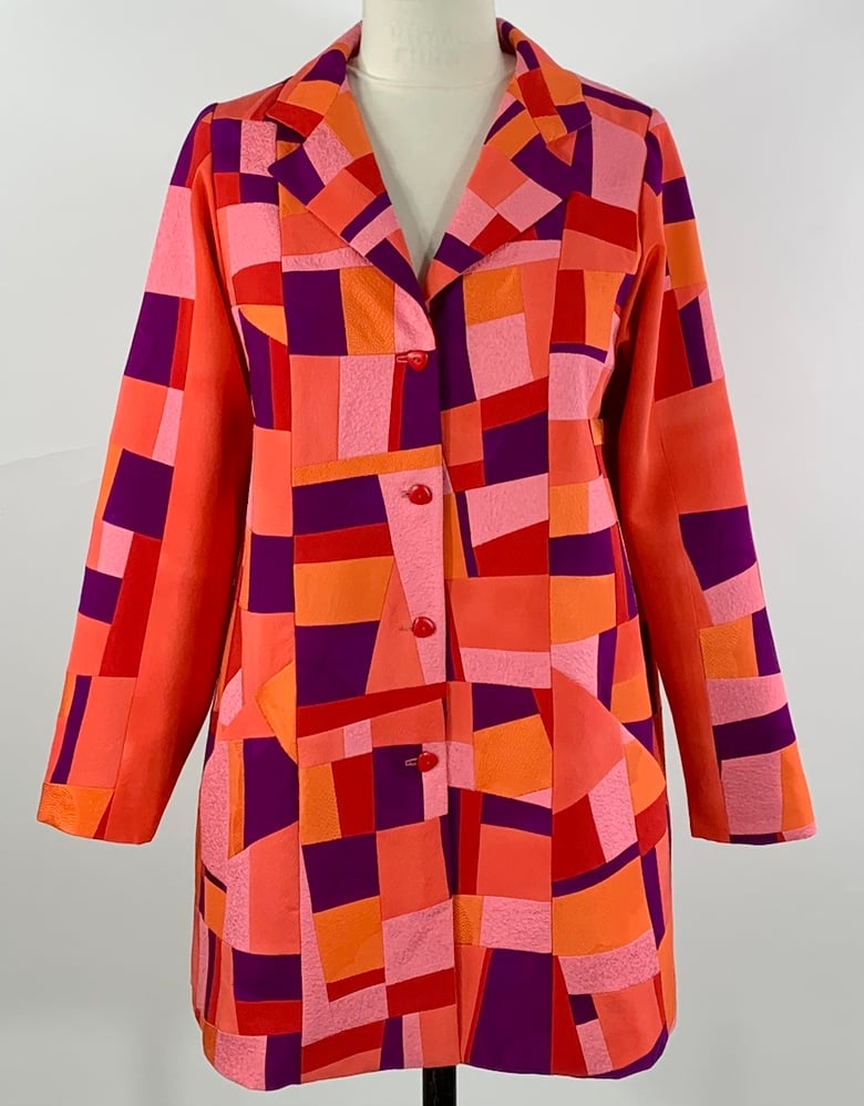 Image of Orange Pink and Red with Purple Trench