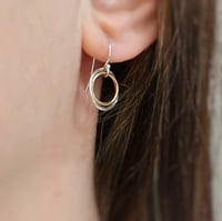 Image 5 of Dainty silver and gold circle earrings