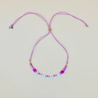 Image 2 of All you need is love pearl charm rope choker