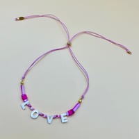 Image 3 of All you need is love pearl charm rope choker