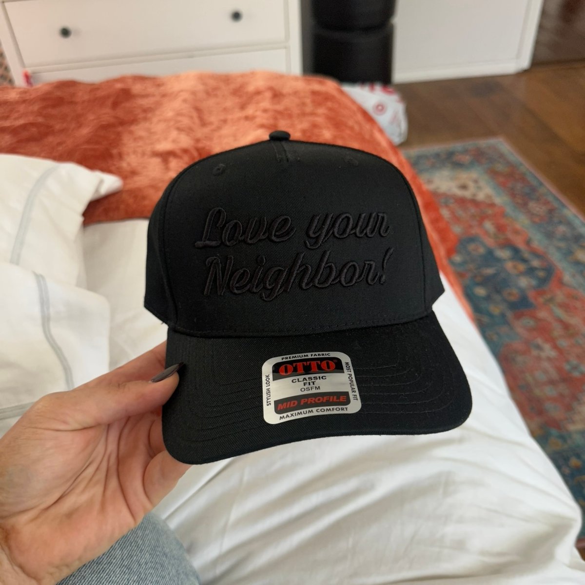 Image of black on black hat