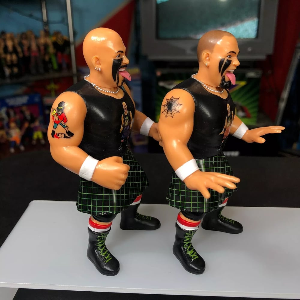  **NO PACKAGING/LOOSE FIGURES** 1 of 250 HEADBANGERS Mosh & Thrasher Wrestle-Something Wrestlers FC