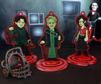 Image 1 of Saw Apprentices charm standees