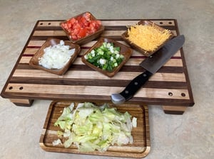 Image of Walnut, Maple and Purple Heart Raised Cutting Board with catch bowls and plate, Chopping Board