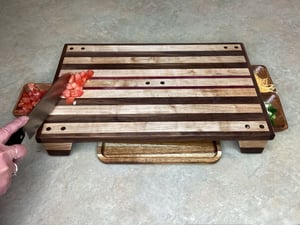 Image of Walnut, Maple and Purple Heart Raised Cutting Board with catch bowls and plate, Chopping Board