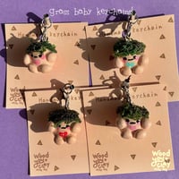 Image 1 of Grass baby keychains