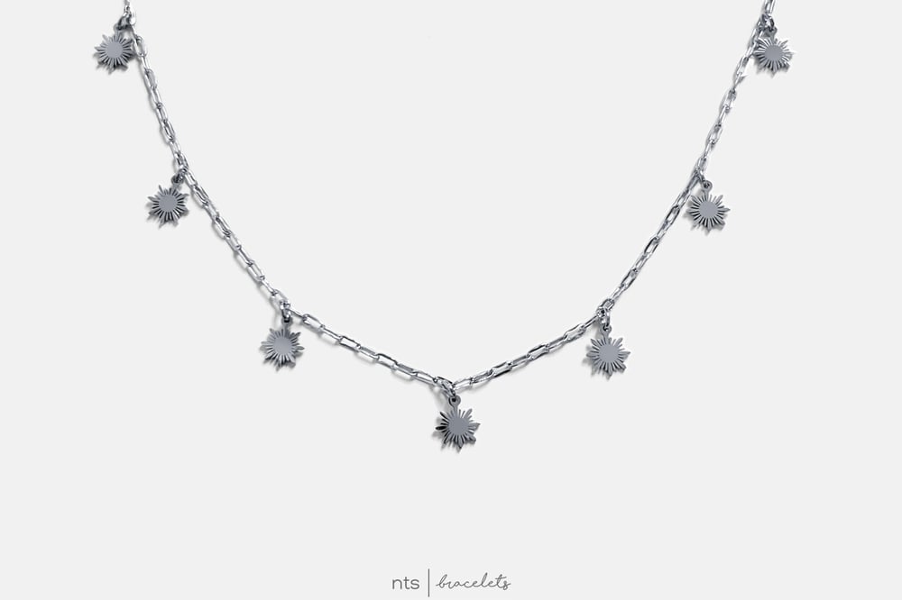 Image of SILVER 8 SUN CHARM NECKLACE (Silver)