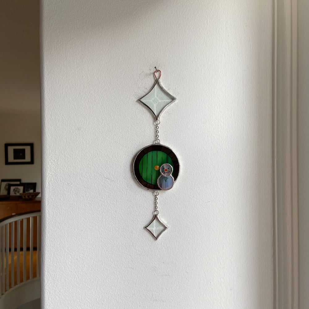 Image of Yuletide Halfling Home with Snowman 