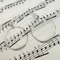 Carl Barât guitar string earrings
