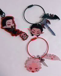 Image 2 of cazador and astarion ringlet charms