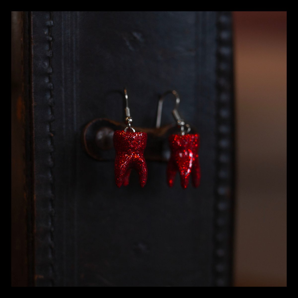 LIMITED EDITION: 3-root molar earrings in Ruby
