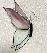 Image 1 of Side facing butterfly