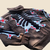 Image 7 of REWORKED CRACKY 3D PUFF SKELETON WITH BLUE FLAME SUN FADED HOODIE SIZE LARGE