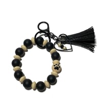 Image 4 of Wristlet Silicone Key chain adorned with hand made Tassel & Charms by Lazy Hound Gifts