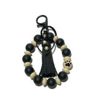 Image 3 of Wristlet Silicone Key chain adorned with hand made Tassel & Charms by Lazy Hound Gifts