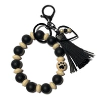Image 1 of Wristlet Silicone Key chain adorned with hand made Tassel & Charms by Lazy Hound Gifts