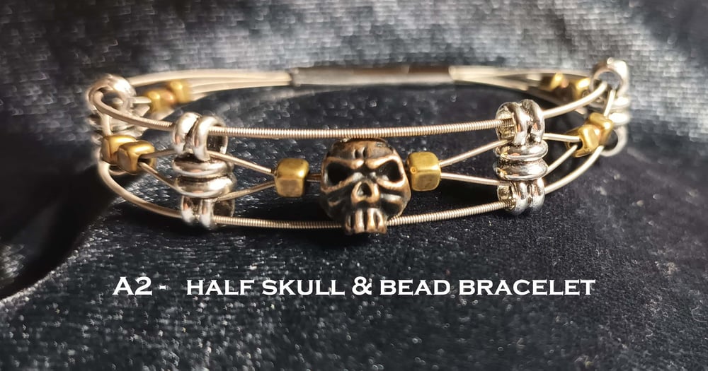 Image of  Half Skull and Bead Guitar String Bracelet
