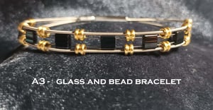 Image of Glass Tile and Bead Guitar String Bracelet