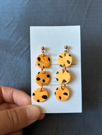 Image 1 of Spotted Orange Circles earrings