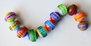 Frankenspheres - 11 round beads with stitches