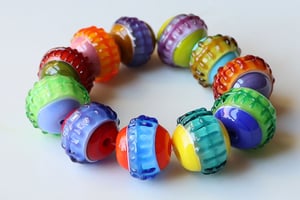 Frankenspheres - 11 round beads with stitches