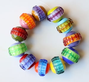 Frankenspheres - 11 round beads with stitches