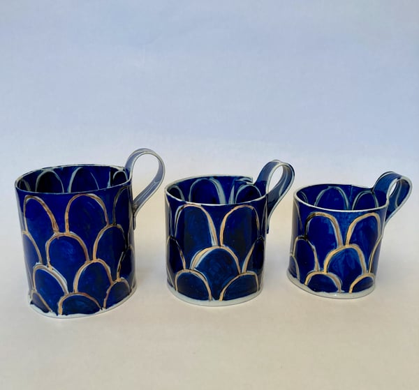 Image of Deep blue and gold scale cups
