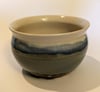 Hand thrown, stoneware pot with blue and green glaze.