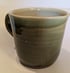 Hand throw, stoneware mug with green glaze Image 2