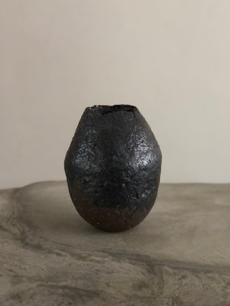 Image of irregular ceramic vase