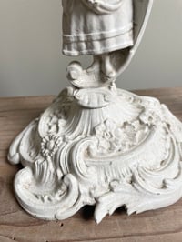 Image of Paire de bougeoirs patinés