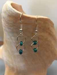 Aretes aqua